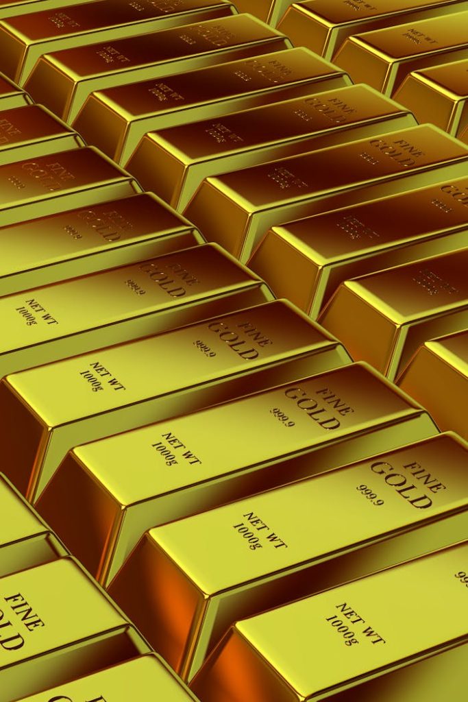 Shiny gold bars stacked neatly, symbolizing wealth, investment, and financial security.